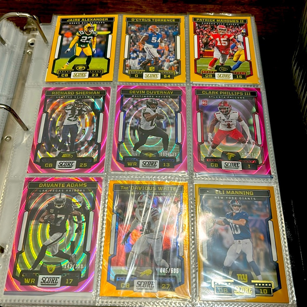 Assortment of diffrent cards golden and #\# numberd cards